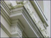 Plasterwork above a door