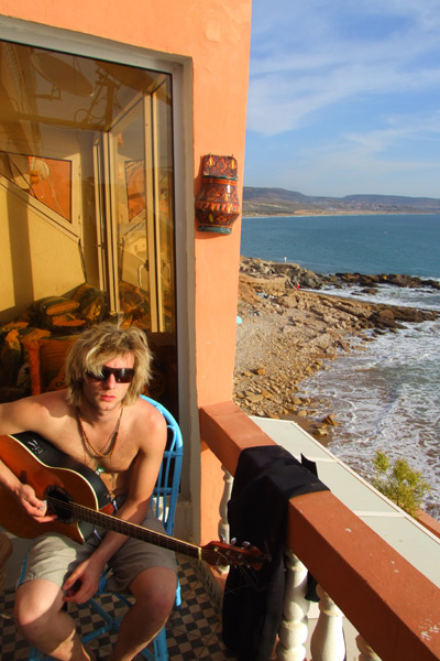 Guitar and surf. Derry's Keith Harkin lovin it. Maroc 08. Pic Billy