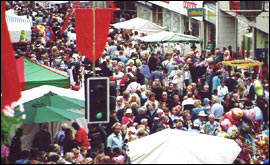 Crowds weave like ants through the town