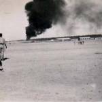 Hudson crashes into petrol dump in the act of taking off on a detachment prior to El Alemein. Photographs of the crash and the burial of the victims.