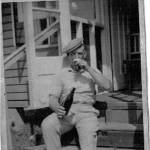 This is my father, enjoying a quart bottle of beer on holiday in Hayling Island in Hampshire,and the pub was only across the road, from where he was staying, so he could always nip across for a refill. He always enjoyed a good glass of beer.