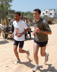 An improper runner: Tim Franks running alongside Gazan long-distance athlete Nader el-Masri 