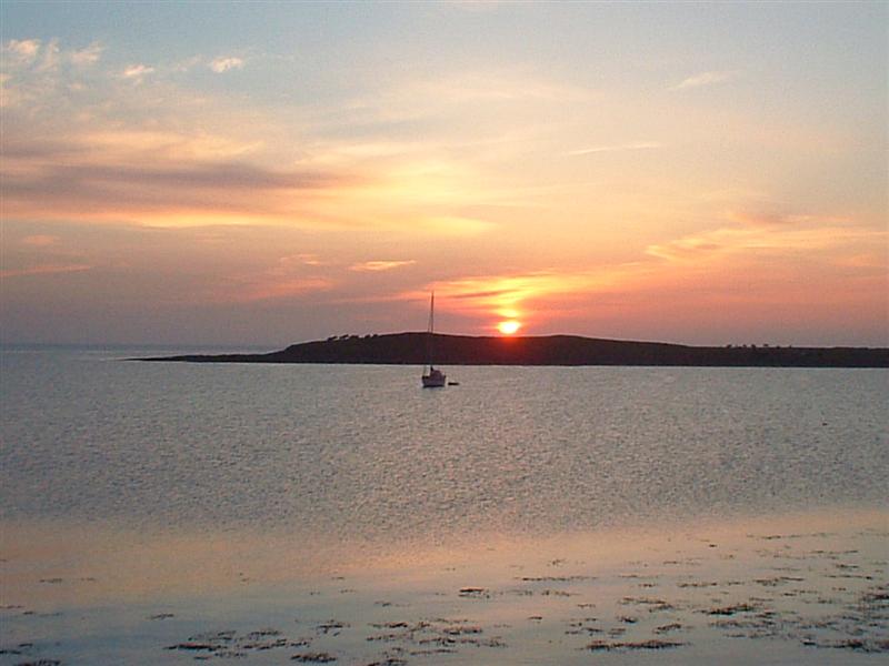 A Visiting Yacht Anchored in The Bay of Brough.