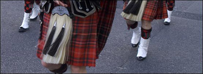 Close up of kilts on men