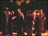 A group of teenagers drinking on the street