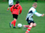 Kids playing football.