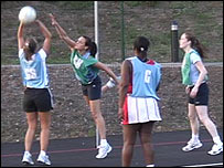 Netball players in a game