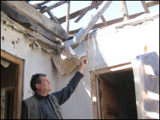 Grecia shows the destruction of his home