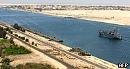 An Egyptian patrol ship navigates the Suez Canal