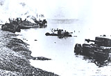 After Dieppe, tanks and craft burn on the beach, August 1942