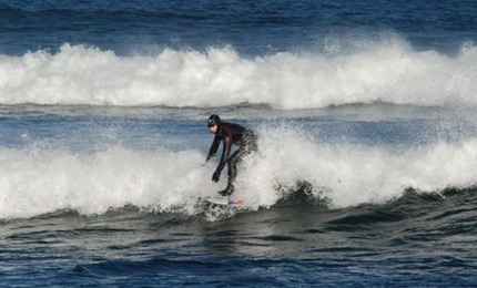 Paul gets his reef baptism, stoked to do so. Pic Hugh Feb 07