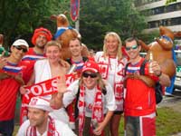 A group of polish supporters with some australians and Kangeroos