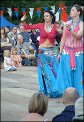 A couple of traditionally dressed French ladies explain the finer points of French Cuisine. Picture by Craig McGinty