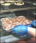 Uncooked faggots go into the oven