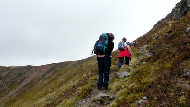 Mountain guide Lisa King and Shona Benvie climbing towards Mayar