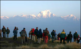 Tourists witness the sunrise