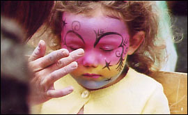 Face painting gets underway on the streets