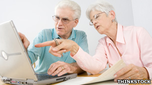 Elderly couple with laptop