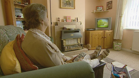 Valerie Morris watching TV.