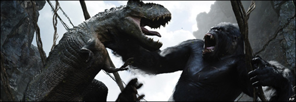 King Kong battles a dinosaur in a scene from the attraction "King Kong 360 3-D"