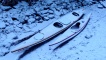 The kayaks in the snow.