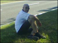 John Smith resting during charity bike ride