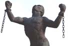 Photograph showing the statue of Bussa which represents slavery, revolt and emancipation in Barbados