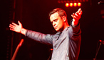 Robbie Williams performs at BBC Electric Proms 2009