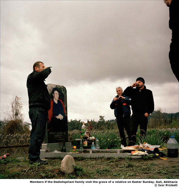 Family at a relatives grave