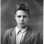 My passport photo in 1946 in my best clothes, aged 16. I had forgotten how to smile.