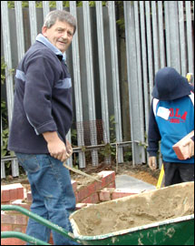 Alan Cobb builds the bbq