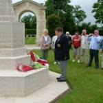 4th June 2004, Hottot-Les-Bagues War Cemetery, Normandy. Joan and Joe Toner (1st and 2nd right) watch Mr Joe Pooley Normandy Veterans Association (West Cumbria) Branch Chairman lay a commemorative poppy wreath to remember the Fallen.
