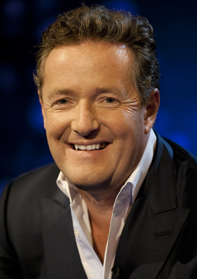 Piers Morgan grinning