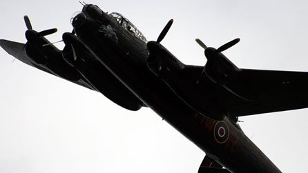 Lancaster bomber flies overhead