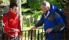 Derek and Dave entering the churchyard