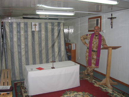 The Reverend Andrew Martlew standing inside St Jude's Church
