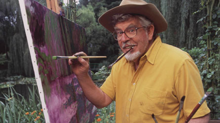 Rolf Harris painting in Claude Monet's garden in Giverny, France - painting water lilies in the style of Monet for the programme Rolf on Art in 2001