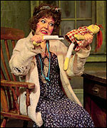 Ruth Madoc as Miss Hannigan in Annie