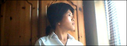 Caroline looking out of the window