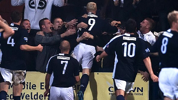 Dundee fans show how much they care about their team. Photo: SNS