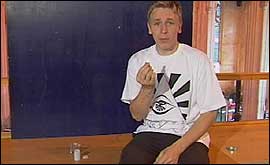 Pic: James holds a tablet.