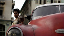 A Cuban taxi and a woman