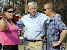 Kevin Rudd with residents in the fire-hit town of Kinglake