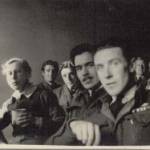 This is a picture of me, Leslie Angell, with my colleagues in the RAF. I'm the one holding the cup.