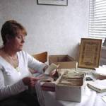 Pat reading her parent's letters