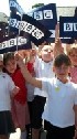 children waving BBc flags