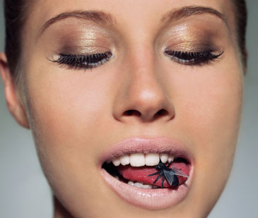 Woman eating a fly