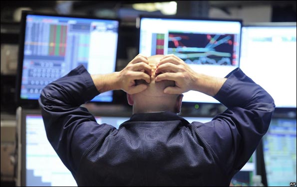 Trader on floor of New York Stock Exchange
