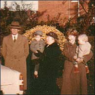 Mervyn' s parents in 1957 with his wife and 2 children