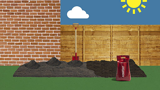 Compost being dug into a vegetable patch.